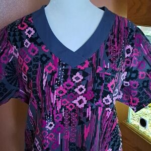 UA Scrubs Pink and Black Geometric V-Neck Top